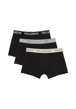 Trois boxers noirs pour hommes avec taille élastique en noir, gris et blanc, tous estampillés du texte "PULL&BEAR".