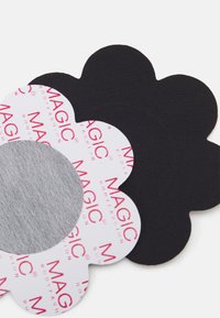 Pétales adhésifs en tissu noir et gris avec l'étiquette "MAGIC BODYFASHION" en rose sur un centre circulaire blanc pour application sur des vêtements.