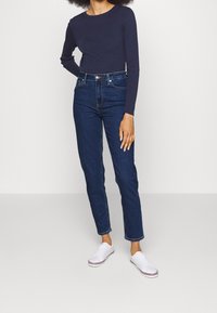 Tommy Hilfiger Vaqueros pitillo - dark-blue denim