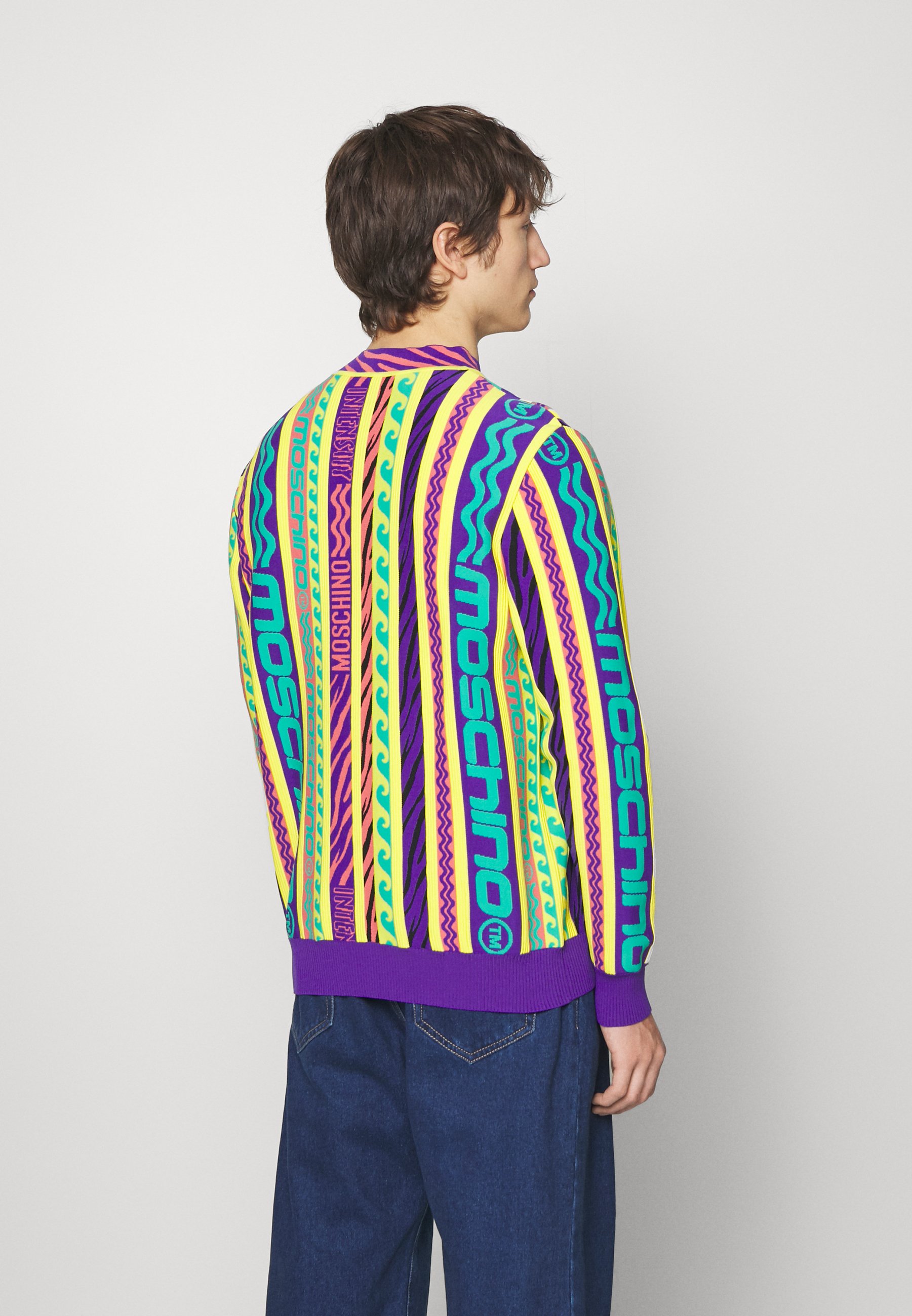 yellow moschino jumper