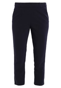 Granatowe spodnie bawełniane z elastanem, z elastycznym pasem, krojem 7/8, gładką fakturą i bez widocznych kieszeni czy akcentów.
