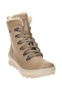 Beige wasserdichte Stiefel mit Kunstfellbesatz, runder Zehenpartie und strukturiertem Gummisohle. Verfügt über Metallösen und Schnürverschluss für eine verstellbare Passform.