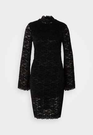 Black lace dress with long bell sleeves, high neck, floral pattern, and scalloped hem. The fabric is semi-transparent, highlighting the texture.