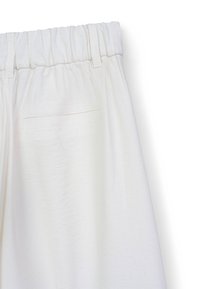 Pantaloni con elastico in vita bianchi, realizzati in un tessuto testurizzato, taglio dritto e una tasca posteriore discreta con una delicata cucitura.