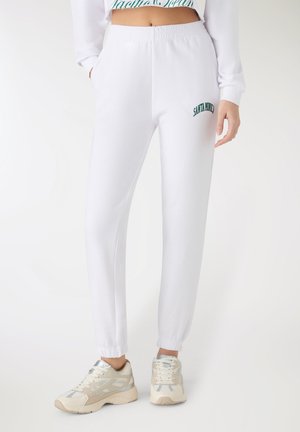 - Spodnie treningowe