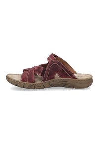 Red leather slide sandal with cross-strap design, textured surface, brown sole, and white stitching. Open toe and slip-on style.