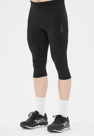 STRONG - Träningsshorts 3/4-längd - black
