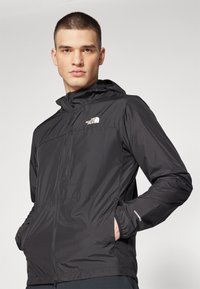 The North Face HIGHER RUN JACKET - Jachetă de vânt - black