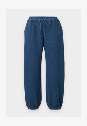 Μπλε υφασμάτινο παντελόνι για χαλάρωση με ελαστική μέση, κορδόνι, πλαϊνές τσέπες και ελαστικά μανσέτες μαζεμένες.