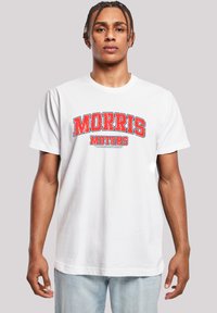 White cotton t-shirt featuring a red and blue graphic print with the text "MORRIS MOTORS." Short sleeves and a regular fit.