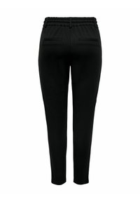 Svarte bukser med elastisk midjebånd, to baklommer og smal passform. Glatt stoff med myk tekstur.