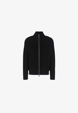 Giacca nera in maglia a costine con zip, colletto alto e zip in argento, caratterizzata da maniche lunghe e un design aderente.