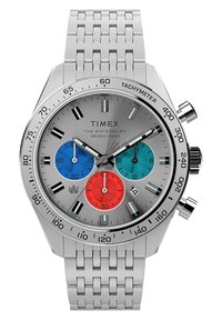 Montre chronographe en acier inoxydable argenté avec un cadran gris, présentant des sous-cadrans bleu, turquoise et rouge. Échelle tachymétrique sur la lunette.
