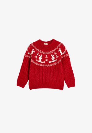 Jersey de punto rojo con patrón de trenzas, que presenta un motivo de copo de nieve blanco y esquí a lo largo del canesú. Cuello redondo clásico y puños acanalados.