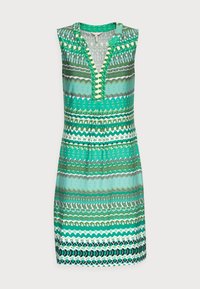 Ärm-lös knälång klänning med gröna, teal, vita och svarta horisontella abstrakta mönster och en V-halsringning.