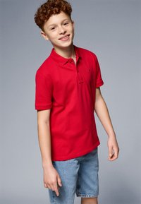 Tommy Hilfiger FLAG - Polo shirt - primary red