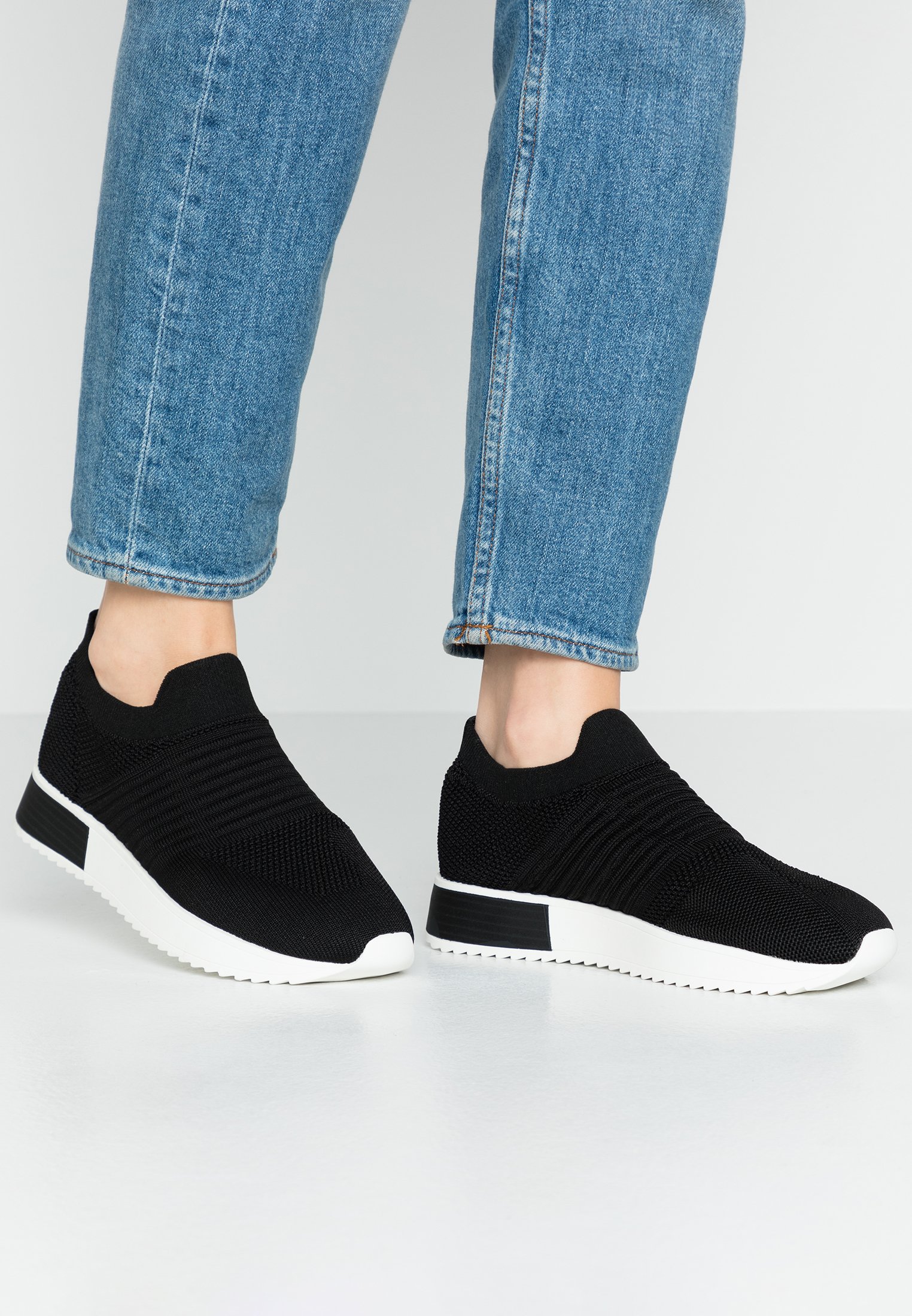 dkny penn slip on sneakers