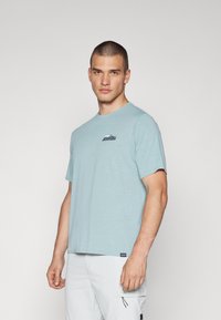 Patagonia CAP COOL DAILY GRAPHIC WATERS - Športne majice - blue