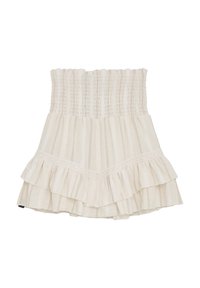 Ljusbeige kjol med en smockad topp, med ett design av flerlagrade ruffle och horisontella randiga texturer. Accentuerad med delikat spetskant.