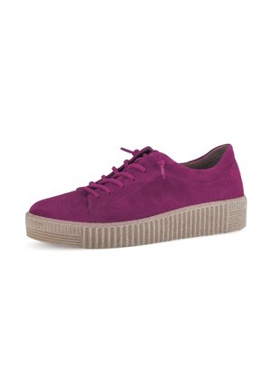 Fuchsia suede sneaker with a rounded toe, textured beige rubber sole, and flat laces. Features soft upper and subtle stitching details.
