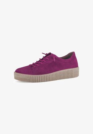 Fuchsia suede sneaker with a rounded toe, textured beige rubber sole, and flat laces. Features soft upper and subtle stitching details.