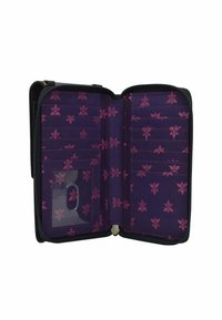 Black zippered wallet interior features a purple lining with a floral pattern in pink. Multiple card slots and a clear ID pocket are visible.
