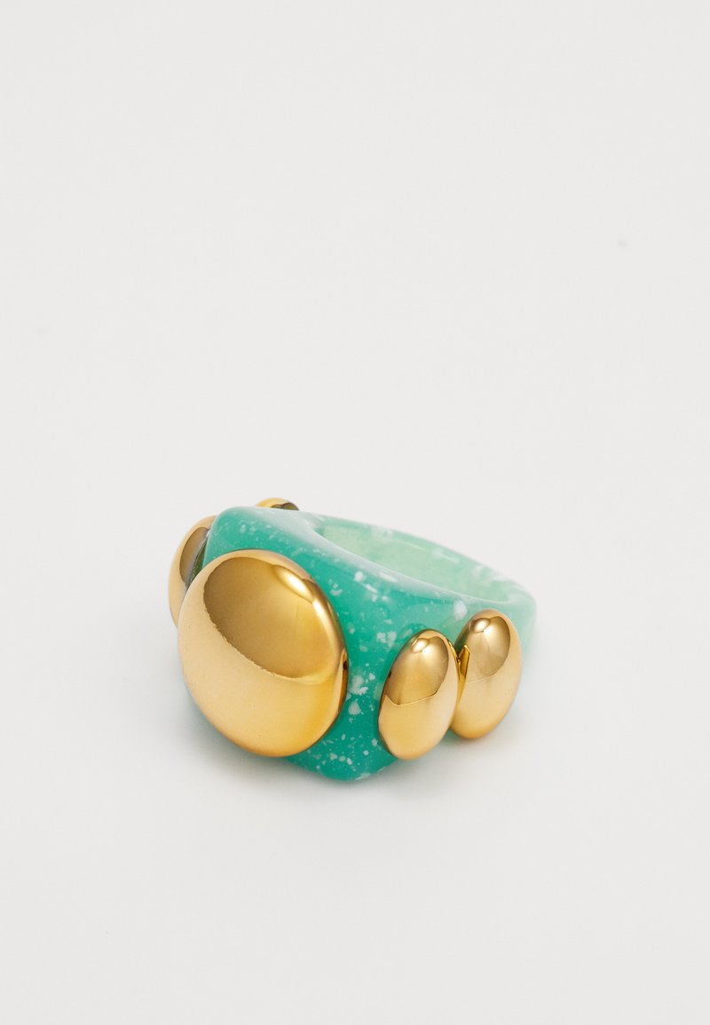 A chunky ring featuring a translucent teal band with marble texture and multiple gold dome accents in varying sizes.