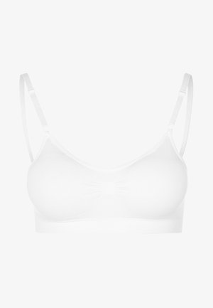 Fehér, varrat nélküli melltartó, puha, rugalmas anyagból készült. Állítható pántokkal rendelkezik, és a középen enyhe gyűrődés található a formáért.