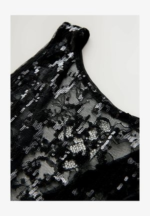 Black lace fabric with silver sequins in an intricate pattern, featuring a rounded neckline and a soft, textured surface.