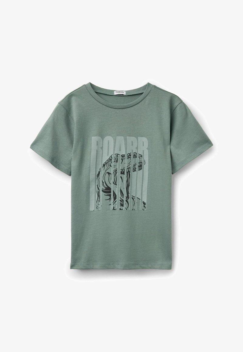 T-shirt vert à manches courtes avec un motif de dinosaure rugissant et le mot « ROARR » en grandes lettres verticales sur le devant.