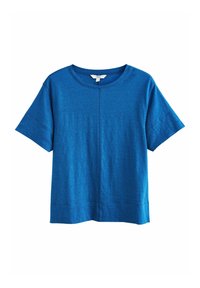 Kortærmet T-shirt i lys blå. Rund hals, løs pasform, lavet af let materiale med subtil tekstur og uden synlige mønstre.