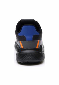 Black athletic shoe with a textured sole, blue and orange accents on the heel and sides, and a mesh upper for breathability.