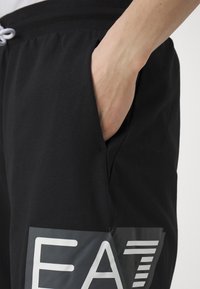 EA7 Emporio Armani Pantaloni sportivi - nero