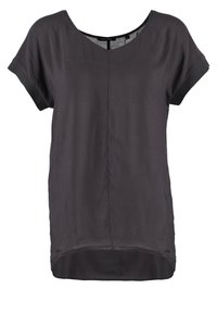 Løs passende grå bluse med korte ærmer, rund halsudskæring og en lidt længere bagkant. Fremstillet af glat, letvægtsstof.