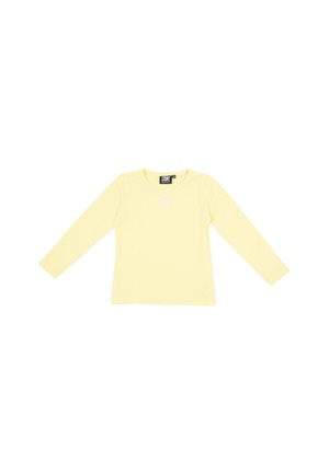 T-shirt jaune pâle à manches longues et à col rond, avec un petit logo blanc sur la poitrine, présenté sur un fond blanc.