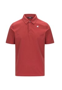 Polo rouge à manches courtes en coton, avec un col classique et une patte de boutonnage. Détail du logo remarquable sur le côté gauche de la poitrine.