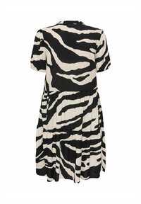 Robe imprimée zèbre noir et blanc avec des manches bouffantes courtes, un col rond et un ourlet à volants en plusieurs niveaux. Fabriquée en tissu léger.