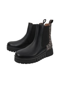 Stivali Chelsea neri in pelle con pannelli laterali elastici, abbinati a un dettaglio in stampa leopardata, dotati di una suola in gomma spessa e una linguetta per il trasporto.