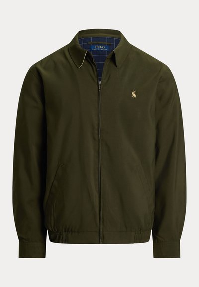 Veste zippée vert olive avec col, poches latérales, ourlet élastique et petit logo Polo Ralph Lauren brodé sur la poitrine.