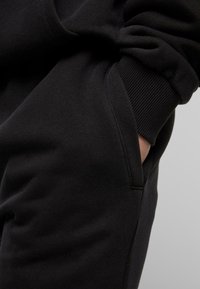 Urban Classics VINTAGE HEAVY - Træningsbukser - black