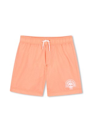 Shorts de bain couleur saumon avec taille élastique, cordon de serrage blanc et logo Timberland blanc sur la partie inférieure de la jambe droite.