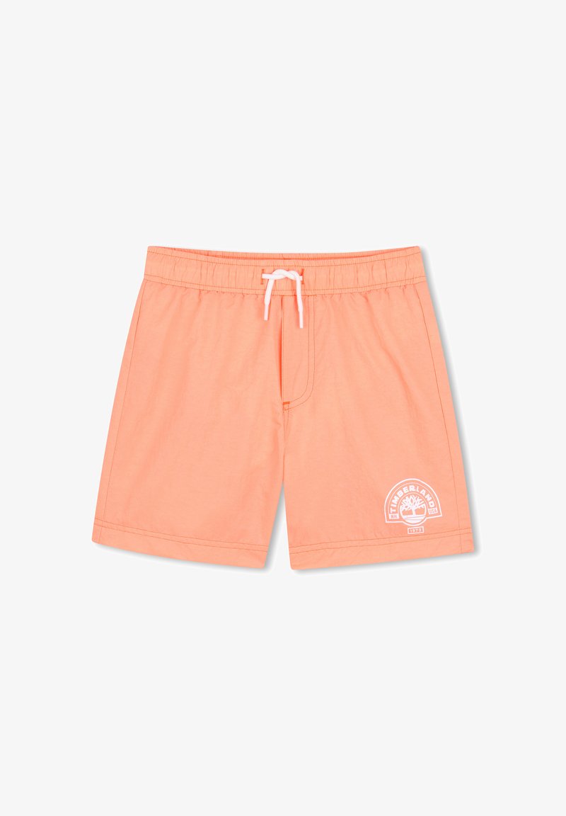 Shorts de bain couleur saumon avec taille élastique, cordon de serrage blanc et logo Timberland blanc sur la partie inférieure de la jambe droite.