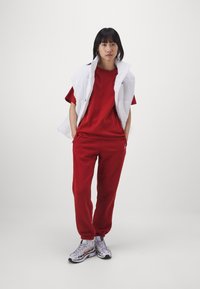 Jordan PANT - Trainingsbroek - dune red