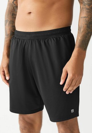 Schwarze Sportshorts aus leichtem Netzstoff mit elastischem Bund. Verfügen über ein kleines Logo am Saum und einen lockeren Schnitt.