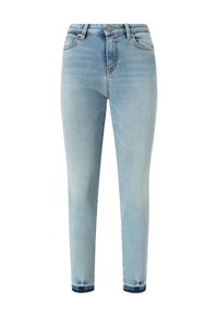 Jean skinny blu chiaro in denim con vita alta, cinque tasche e leggera scoloritura. L'orlo presenta una finitura danneggiata di blu più scuro.