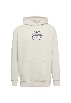 Helebeige kapuutsiga sviiter, mis on valmistatud pehmest kangast. Omab esist otsa ja reguleeritavat kapuutsi. Graafiline tekst "24/7 Planking Club" koos koera illustratsiooniga.