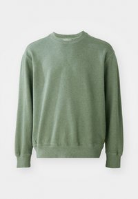 Green crew neck sweatshirt with ribbed cuffs and hem, made from soft, textured fabric. Simple design, featuring no patterns or hardware.