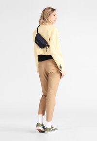 Eastpak SPRINGER - Riñonera - cloud navy