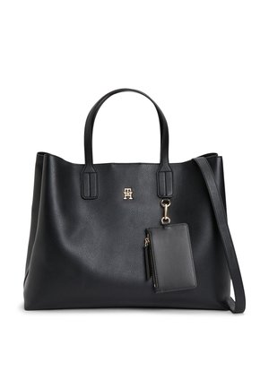 Schwarze Leder-Shopper-Tasche mit zwei Griffen, einer befestigten kleinen Reißverschlusstasche und einem goldfarbenen Logo in der vorderen Mitte.