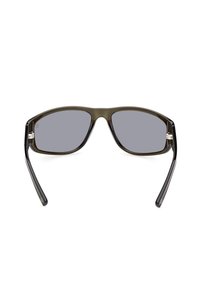 Gafas de sol negras y oliva con lentes rectangulares, lentes ahumados grises y varillas delgadas con detalles metálicos. Acabado mate.